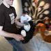Sweetwaters employee Nathan Gire carries a customer's tea to their table  on Tuesday, March 19, 2013. Melanie Maxwell I AnnArbor.com